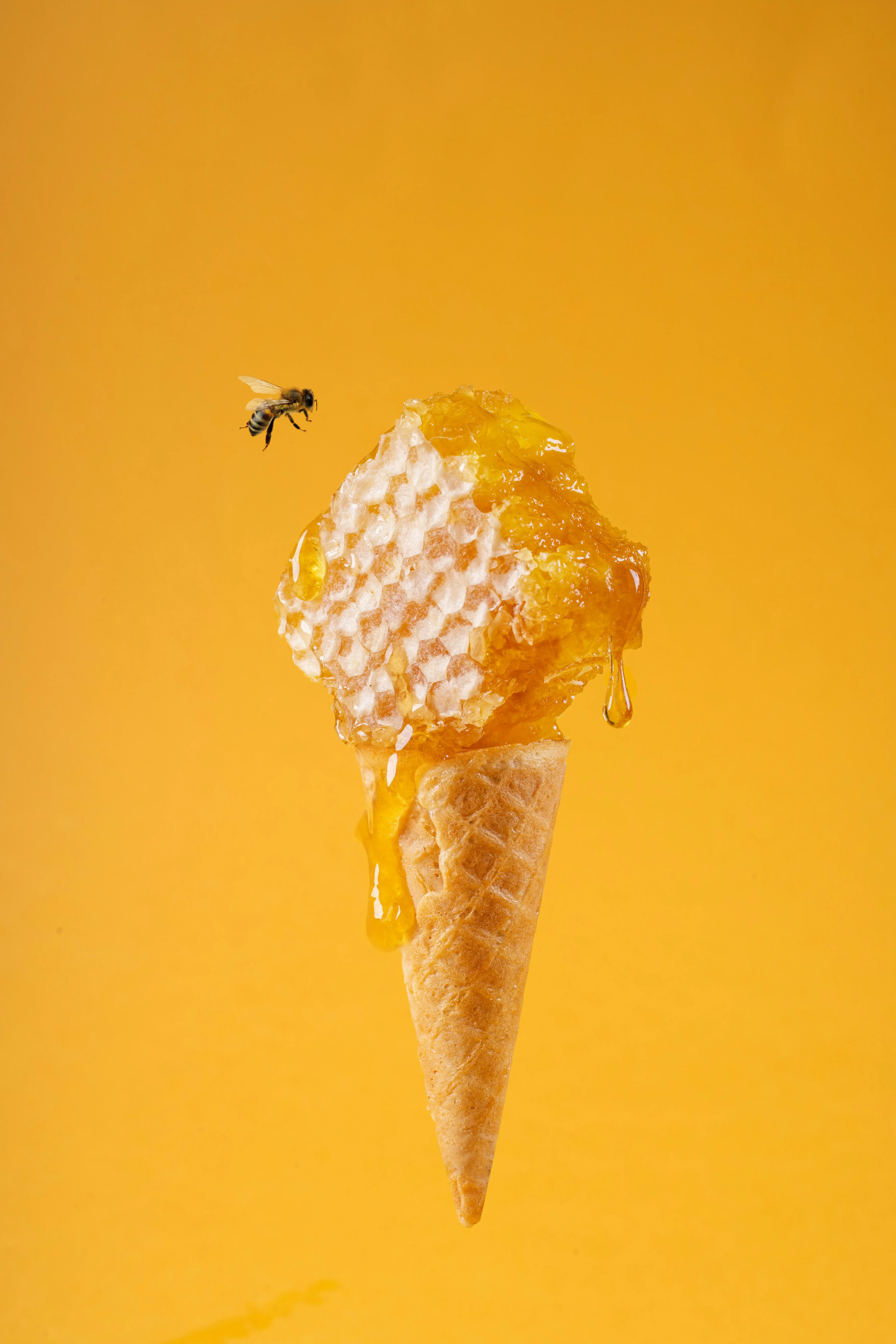 Honeycomb dripping on an ice cream cone